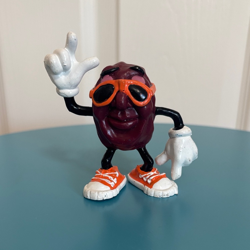 Vintage California Raisin Figurine with Orange Sneakers and Sunglasses